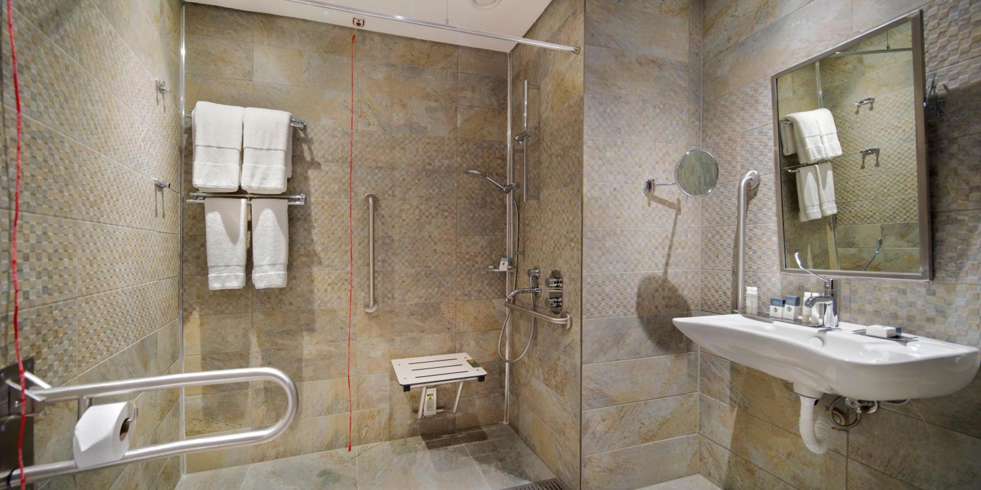 Doubletree By Hilton Istanbul - Piyalepasa Hotel Exterior photo A shower seat